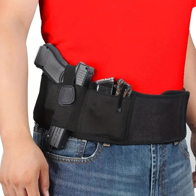 Belly band carrying a pistol and two spare magazines at the waist
