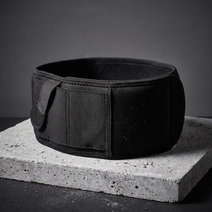 Phantom Belly Band closed into a ring, front holster pocket with its retention strap