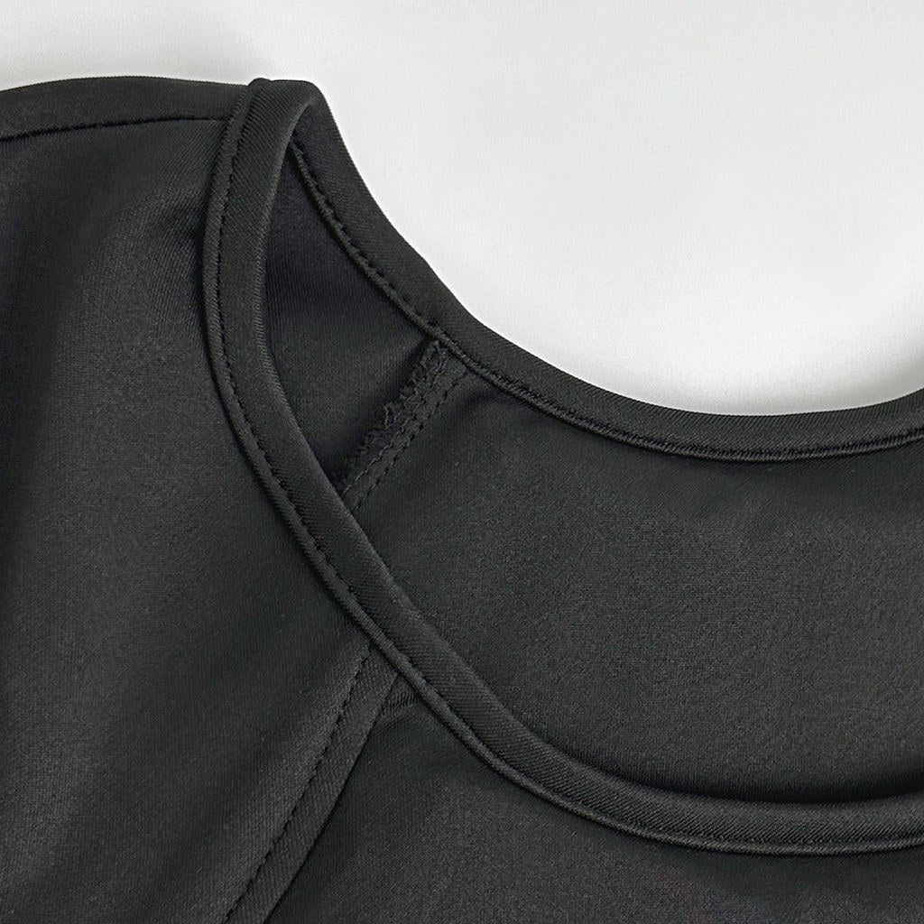 Close-up of the crew neckline and stretch fabric