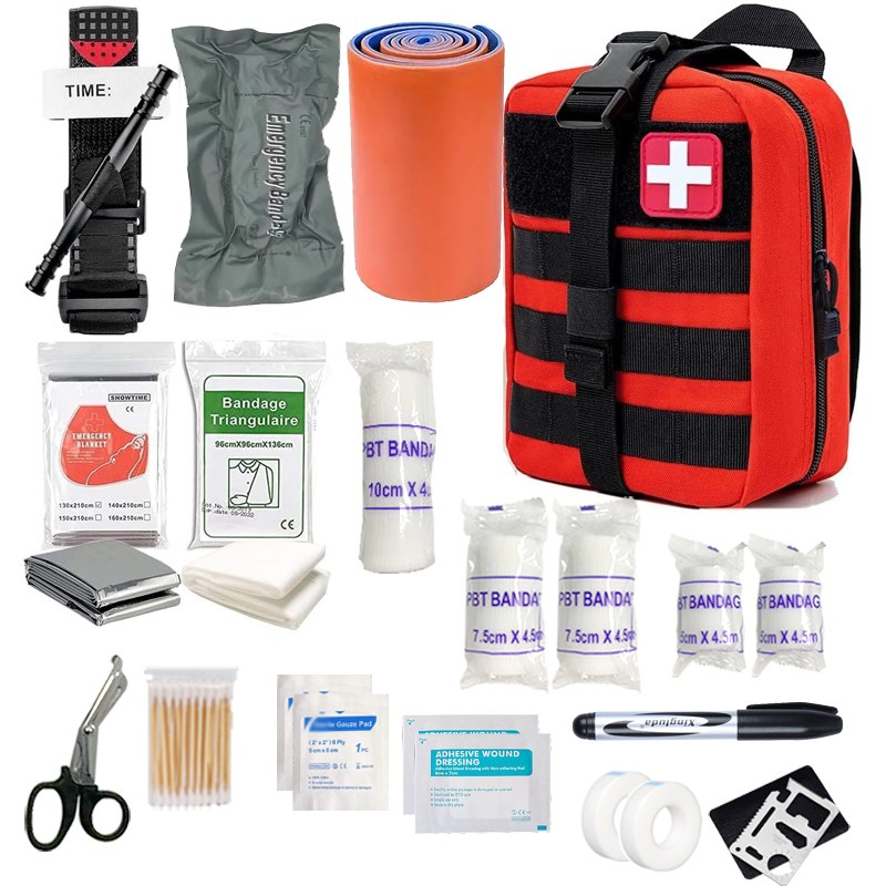 Phantom IFAK Kit in red with its 70 pieces laid out